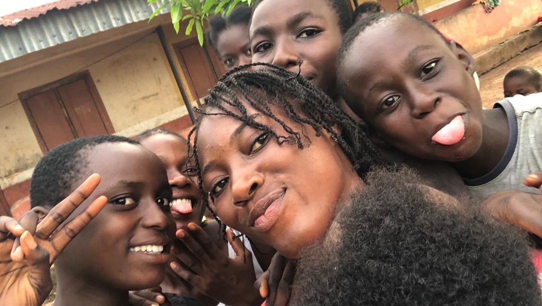 Teenagers holding copies of The Teenage Adventure — Ebonyi State community outreach